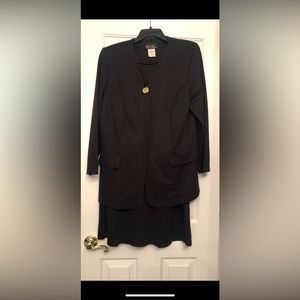A Melissa Harper 2 pc black skirt suit. Size 16WP.